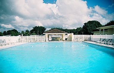 Clubhouse member outside deck and pool area.